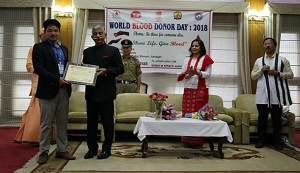 The Governor of Arunachal Pradesh Brig. (Dr.) B.D. Mishra (Retd.) felicitating voluntary Blood Donor on the occasion of World Bloods Donor Day celebration at Raj Bhawan, Itanagar  on 14th  June 2018.